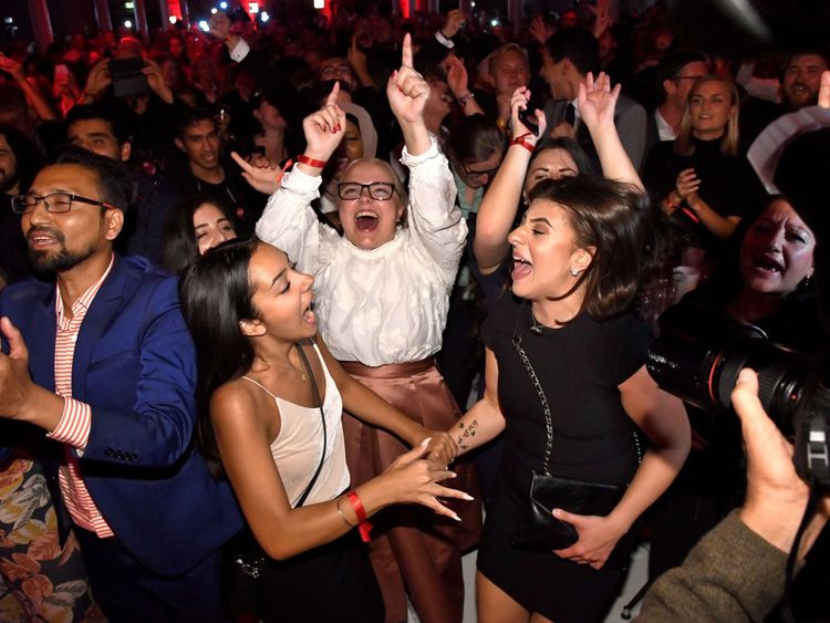 Social Democrat members celebrate despite the party bloc not getting a clear lead