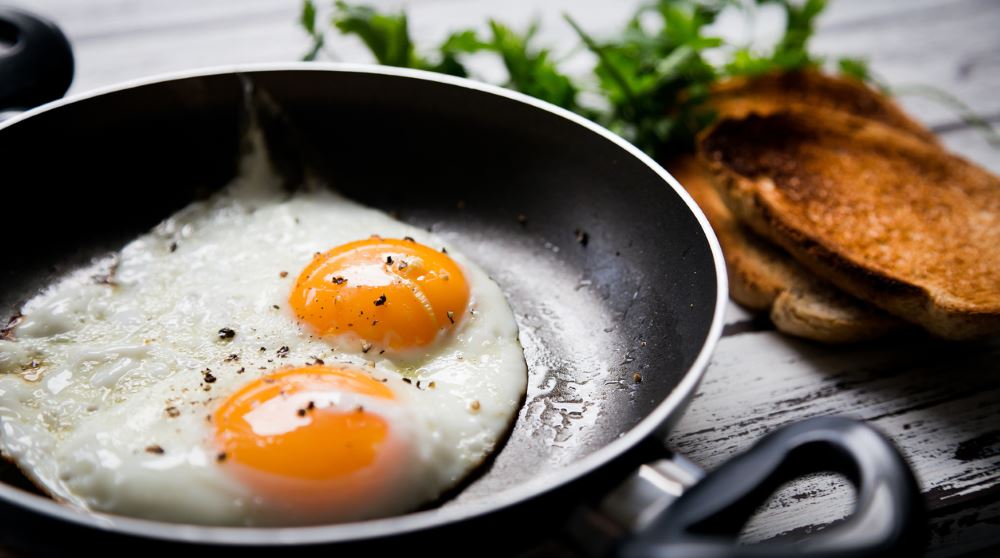 2 fried eggs in pan