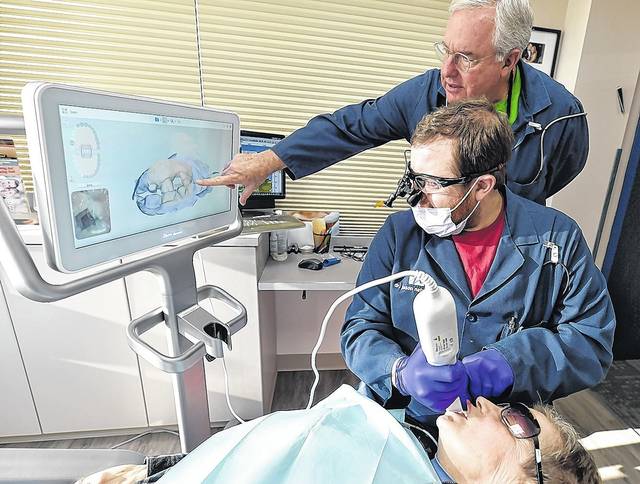 <p>Dentist Gary Nataupsky and his son, Jason Nataupsky, look at a 3D scan of a patient’s teeth in their Kingston office.</p><p>Aimee Dilger | Times Leader</p><p>“></a></p><p>Dentist Gary Nataupsky and his son, Jason Nataupsky, look at a 3D scan of a patient’s teeth in their Kingston office.</p><p>Aimee Dilger | Times Leader</p><div class=