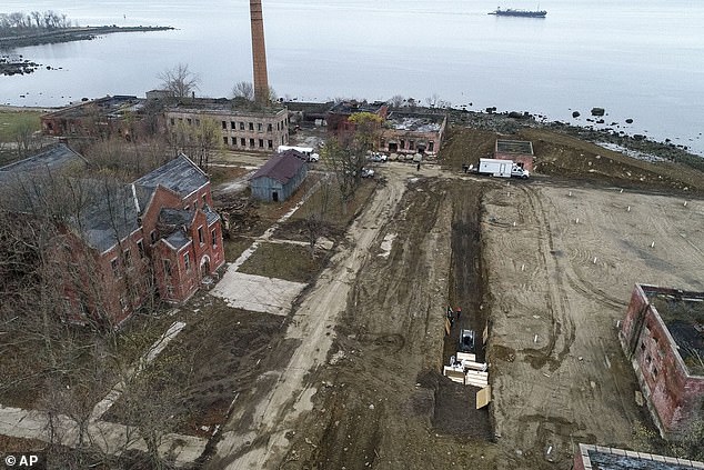 Coronavirus has killed nearly 5,000 people in New York City. Some of their bodies are being buried in plain plywood boxes on Hart Island, horrifying drone photos reveal